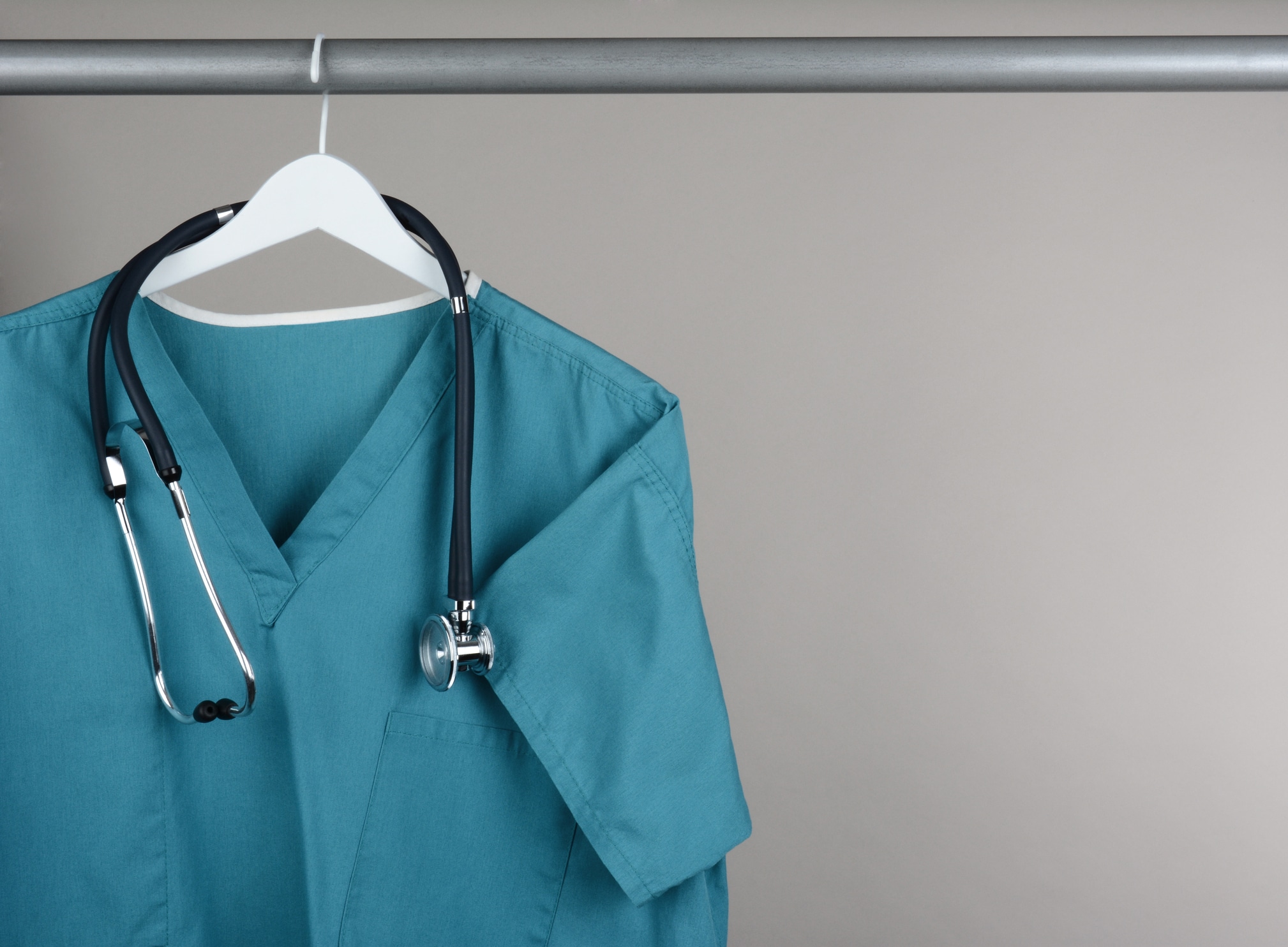 Scrubs with Stethoscope on Hanger Horizontal