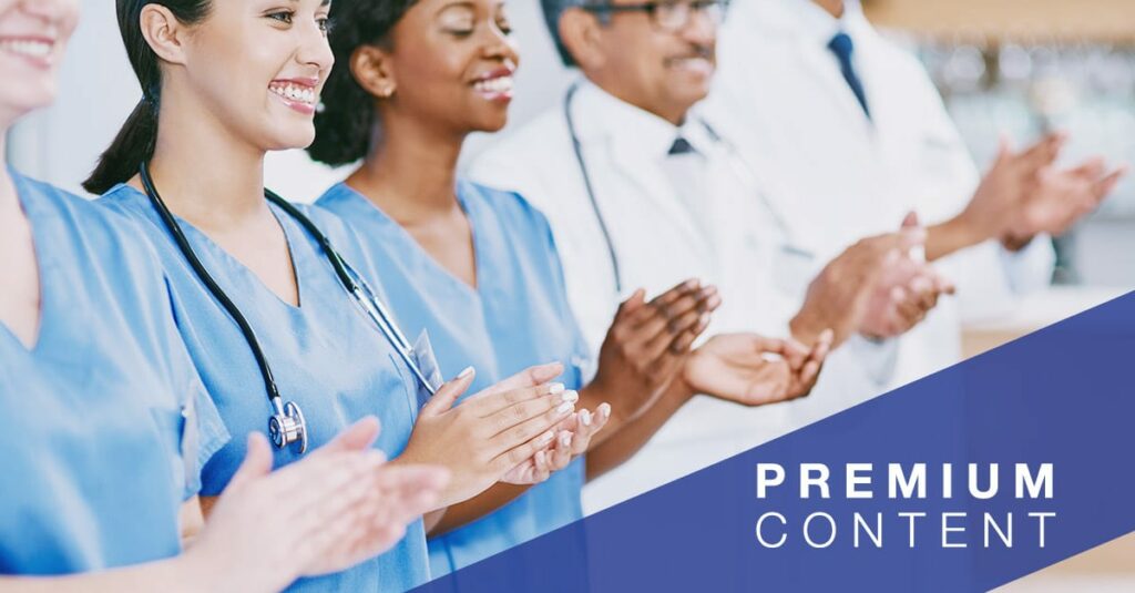 Closeup shot of a group of medical practitioners applauding in a hospital