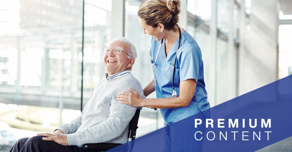 Senior man in a wheelchair with a female nurse