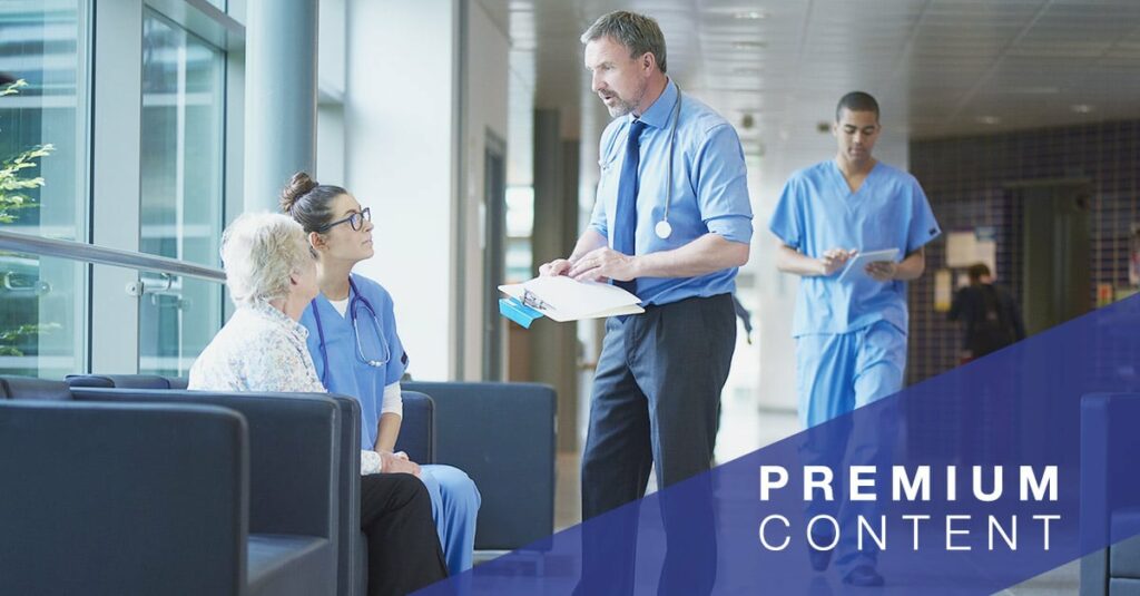 Doctor speaking with a nurse and patient in the waiting room