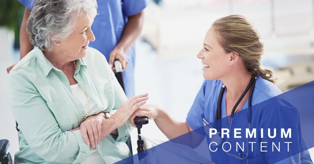 Nurse gladly speaking with patient in wheelchair