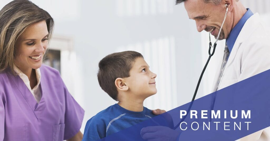 Doctor listening to heartbeat of child patient with nurse close by