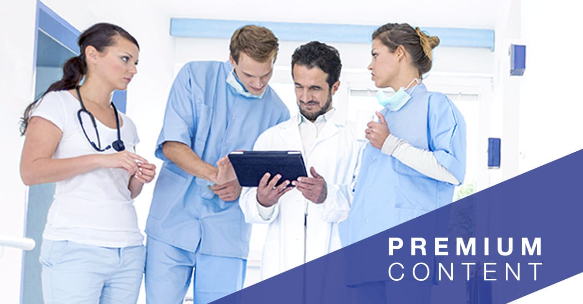 Doctor and nurses viewing a tablet