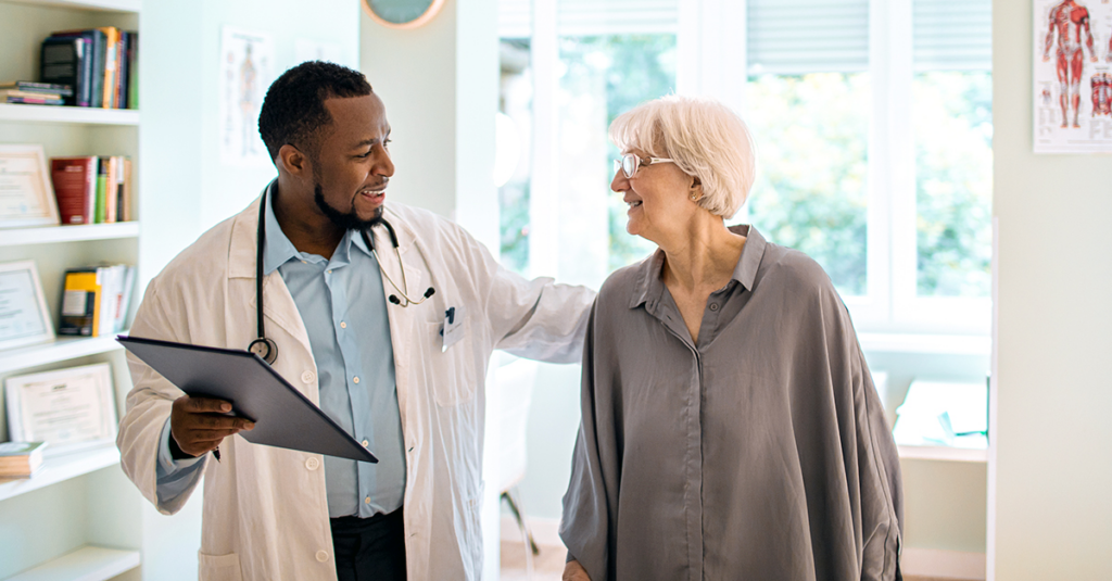 Doctor happily speaking with patient