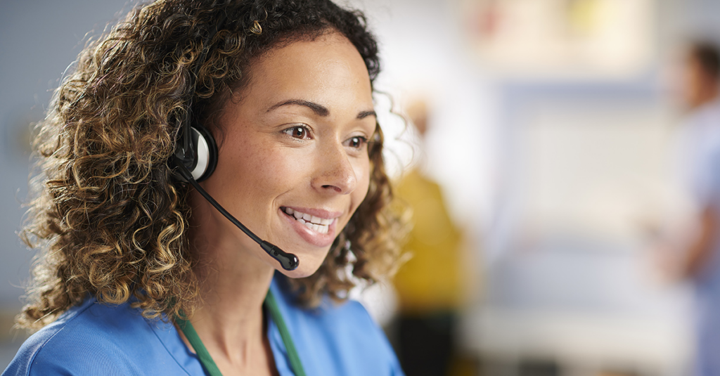 Call center staff speaking with patient following discharge