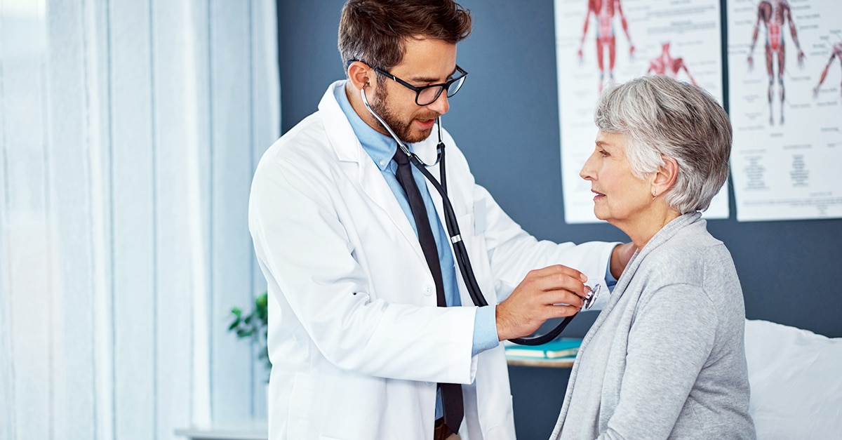 Elderly patient visiting doctor