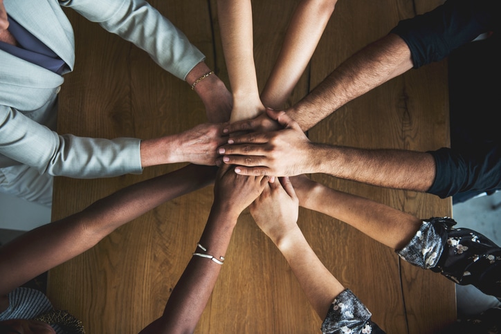 People Hands Together Partnership Teamwork