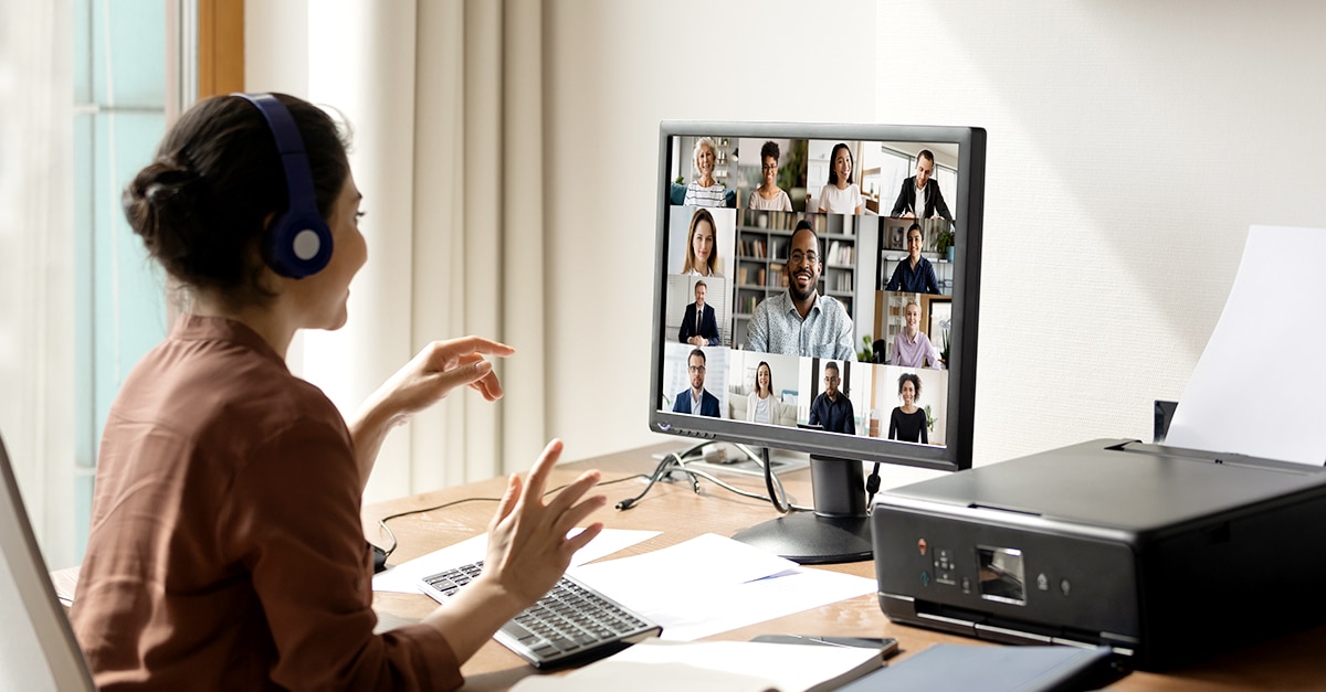 Professional speaking to colleagues in a virtual roundtable.