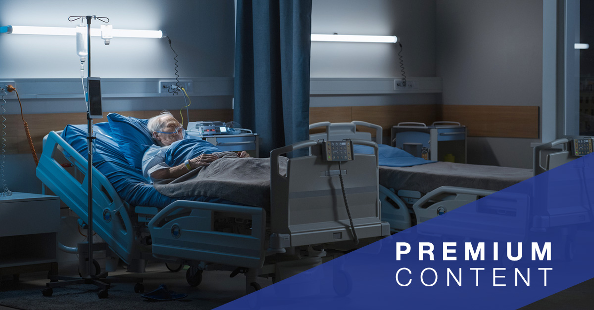 Patient sleeping in hospital bed.