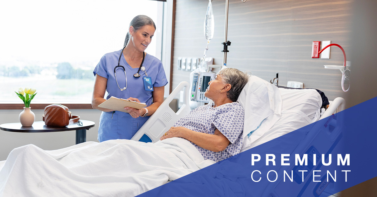Patient speaking with doctor in hospital bed