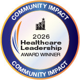 Award badge: 2026 Healthcare Leadership Award Winner with a blue circular frame labeled 'Community Impact' and an orange outer ring.