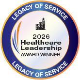 Circular award badge reading '2026 Healthcare Leadership Award Winner' with a blue outer ring 'Legacy of Service' and a gold inner edge.