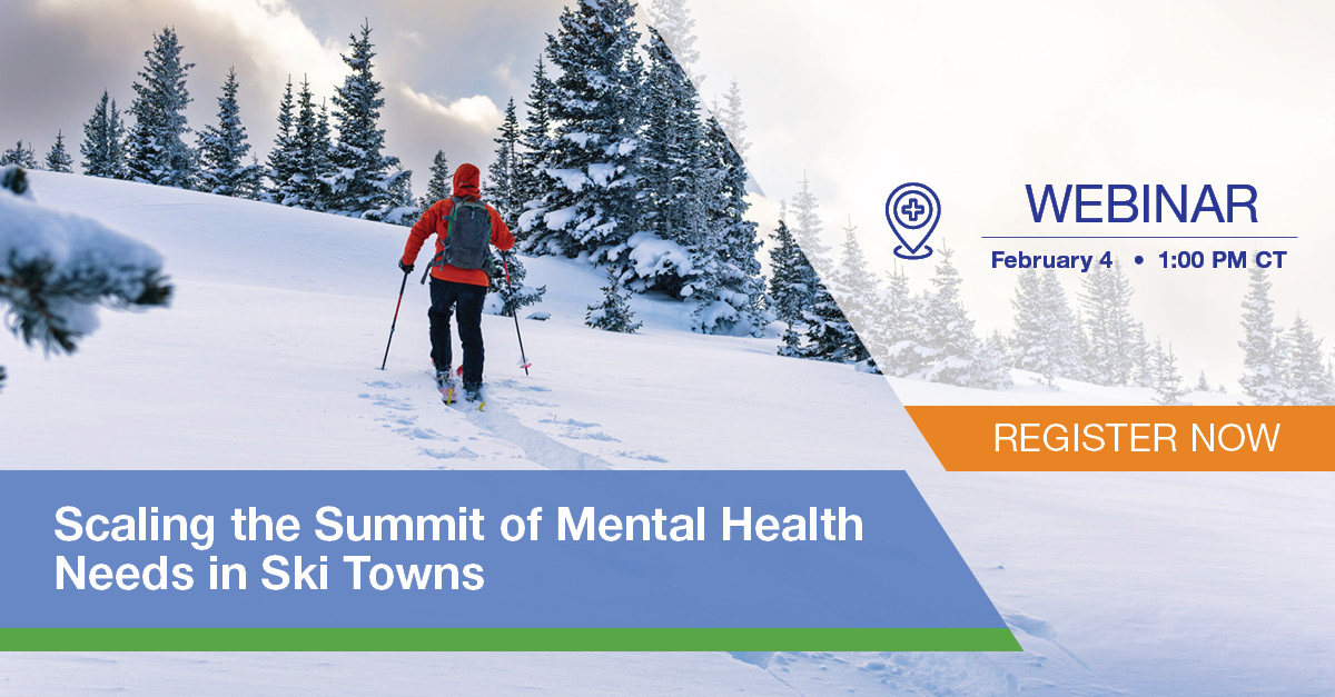 Person on skis traveling up a mountain.