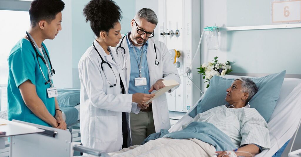 Doctor and care team treating patient.