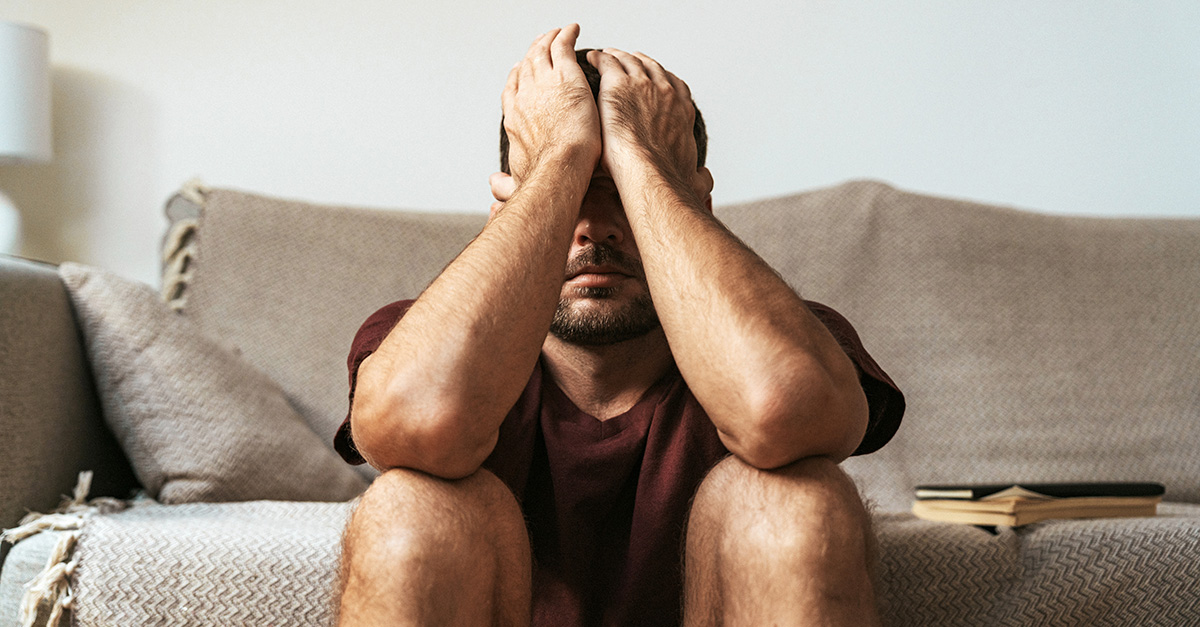 Man struggling with anxiety & depression